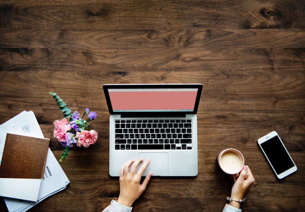 Blogger working on laptop